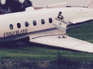 Frightland model employee DD Graves stands on the plane during happy times